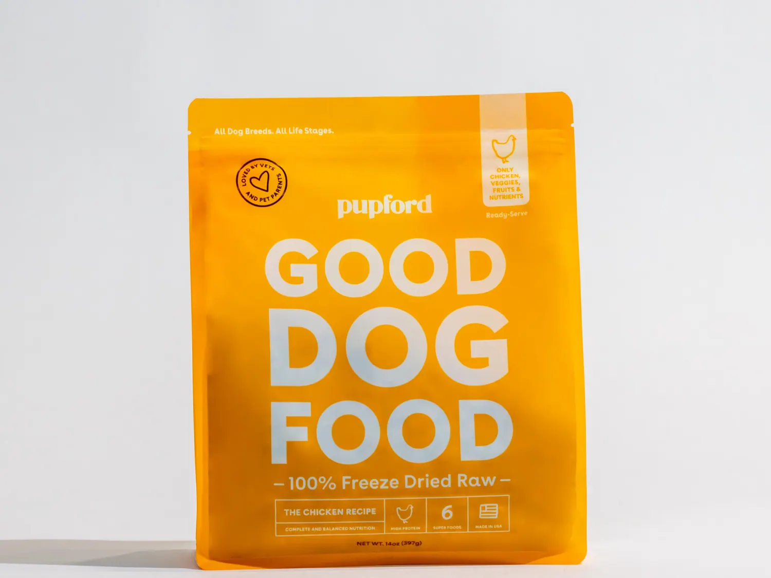 Yellow Good Dog Food chicken recipe bag on a light background